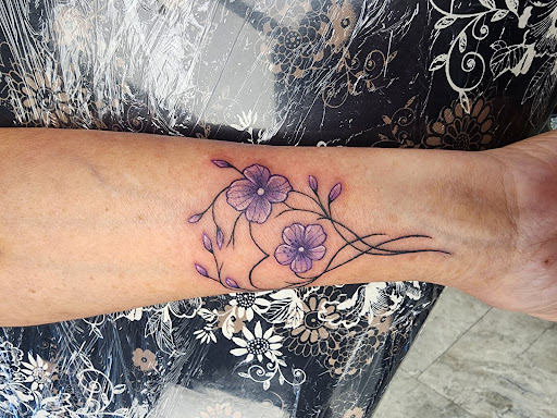 Explore whale tattoo ideas, creative tattoo ideas in Nacogdoches, available at Blue Lotus Piercing and Tattoo