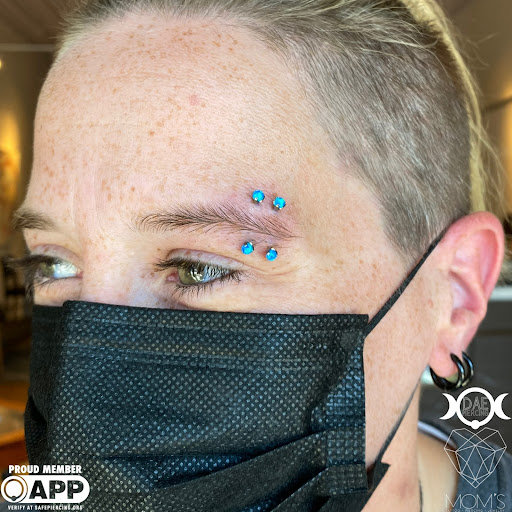 Explore tattoos tramp stamp ideas, creative tattoo ideas in Spokane, available at Moms Custom Tattoo & Body Piercing