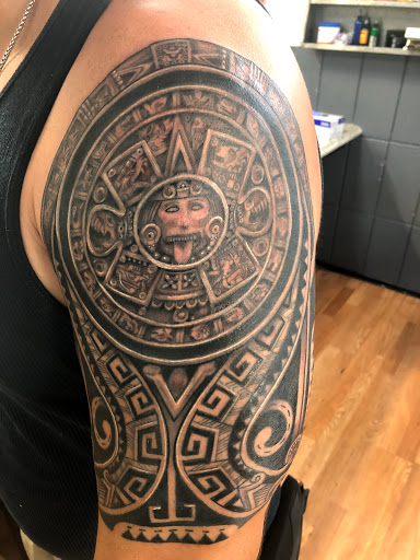 Explore black & white tattoo ideas, creative tattoo ideas in Sarasota, available at SEVEN SINS Tattoo Studio