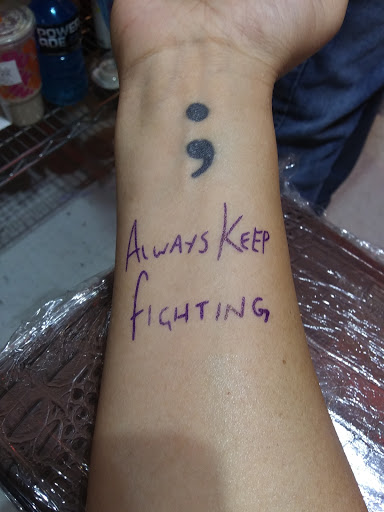 Explore 2 child tattoo ideas for dad, creative tattoo ideas in El Paso, available at Pumping Ink Tattoo Parlor