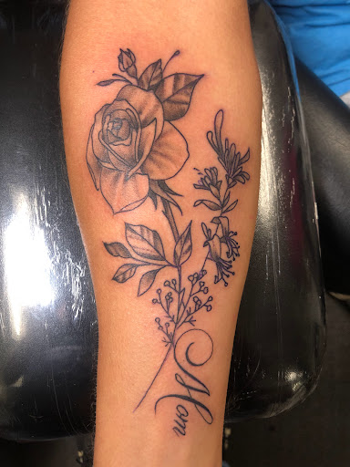 Explore bottom sleeve tattoo ideas, creative tattoo ideas in Englewood, available at Point of Entry Tattoo