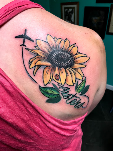 Explore black and grey sleeve tattoo ideas, creative tattoo ideas in Kansas City, available at Golden Stag Tattoo and Gallery
