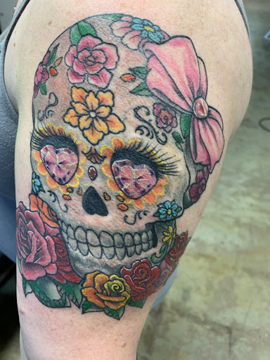 Explore tattoo cover up ideas for cross, creative tattoo ideas in Rogers, available at Wasted Talent Tattoos