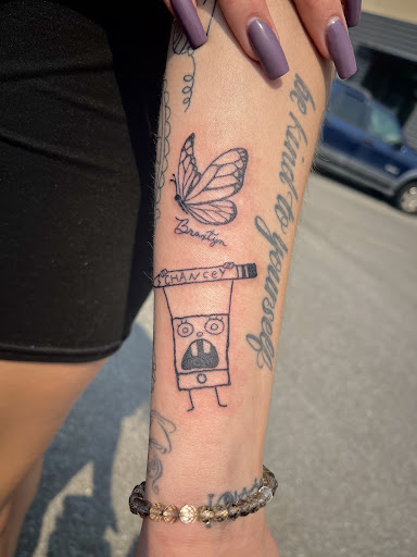 Explore locket tattoo ideas, creative tattoo ideas in Spokane, available at 143 Tattoo Parlor