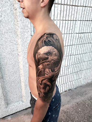 Explore forearm tattoo ideas black male, creative tattoo ideas in Hollywood, available at Sacred Eye Tattoos