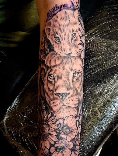 Find lipstick tattoo ideas for your next unique tattoo in Onalaska at Rock Bottom Tattoo Studio