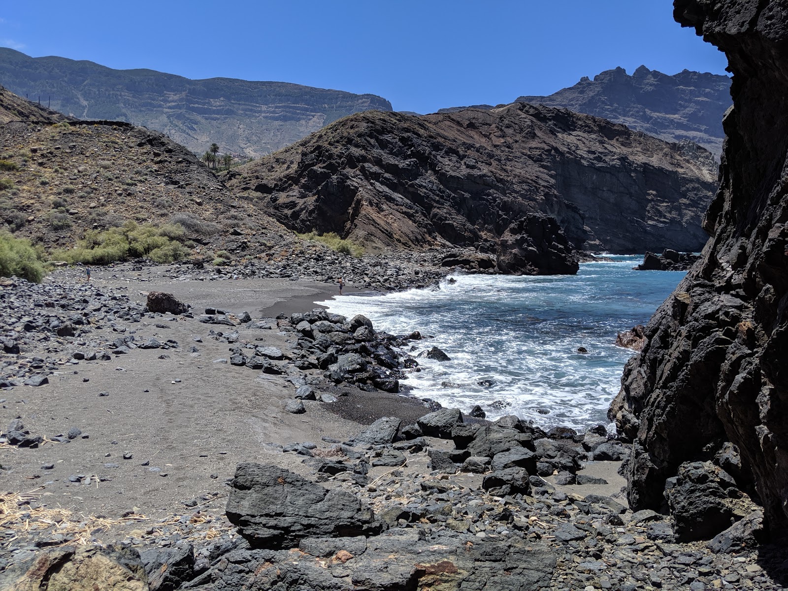 Foto av Playa del Trigo med blå rent vatten yta