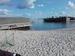Foto von Den Permanente Beach und die siedlung