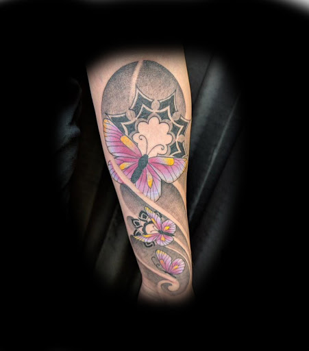 Explore emerald tattoo ideas, creative tattoo ideas in Bradenton, available at Sacred Arts Tattoo Bradenton