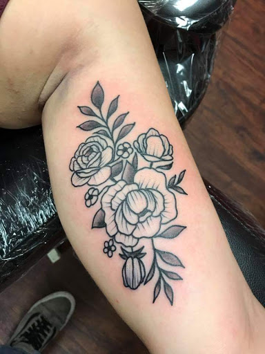 Explore latin tattoo ideas, creative tattoo ideas in Powell, available at Against All Odds Tattoos and Piercings