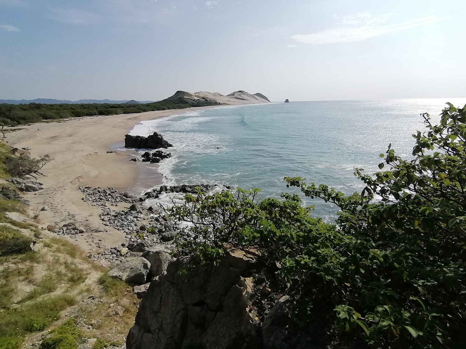 Foto von Escondida beach mit grauer sand Oberfläche