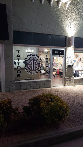 Explore ampersand tattoo ideas, creative tattoo ideas in Winter Haven, available at Angry Elephant Tattoos Winter Haven