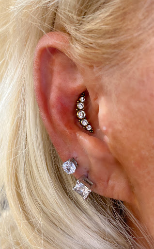 Explore forearm tattoo name ideas, creative tattoo ideas in Springfield, available at Body Piercing By Qui Qui