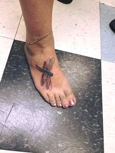 Explore eagle and flag tattoo ideas, creative tattoo ideas in Milwaukee, available at Bay Street Tattoo Co.