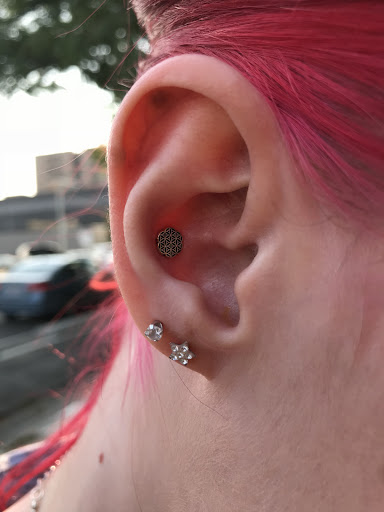 Find sternum tattoo ideas for your next unique tattoo in Salt Lake City at Abyss Body Piercing