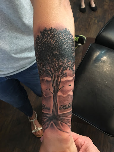 Explore tribal tattoo cover up ideas, creative tattoo ideas in Kingsford, available at Deft Tattoo Studio