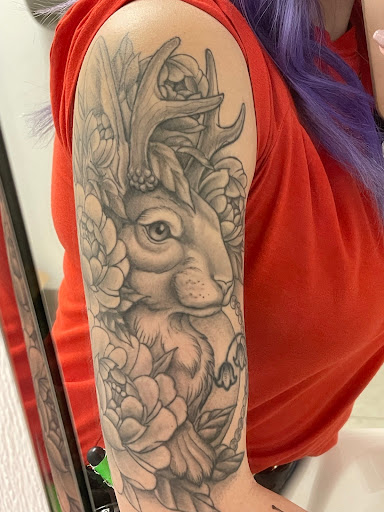 Explore front thigh tattoo ideas, creative tattoo ideas in Midland, available at Two Pines Tattoo