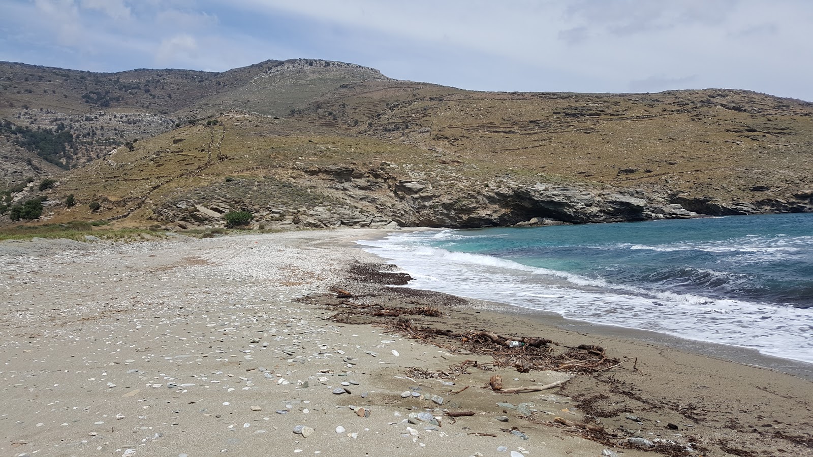 Foto de AI Giannis Onions Beach com areia brilhante superfície