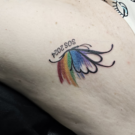 Explore peck tattoo ideas, creative tattoo ideas in Traverse City, available at Pinups & Needles