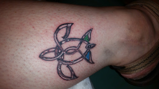 Explore dragon tattoo ideas for females, creative tattoo ideas in Cumberland, available at Queen City Ink