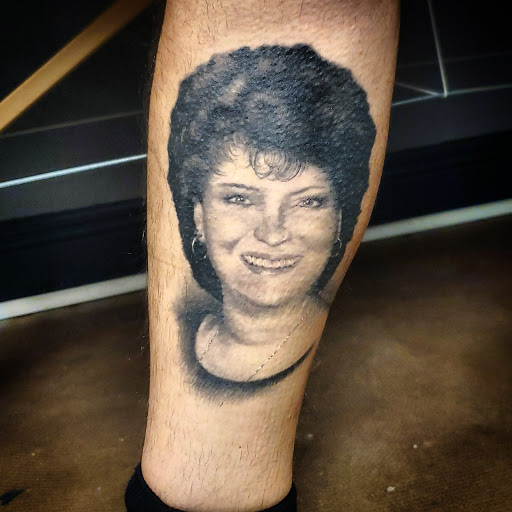 Find between the breast tattoo ideas for your next unique tattoo in Riverview at 9-Line Tattoo