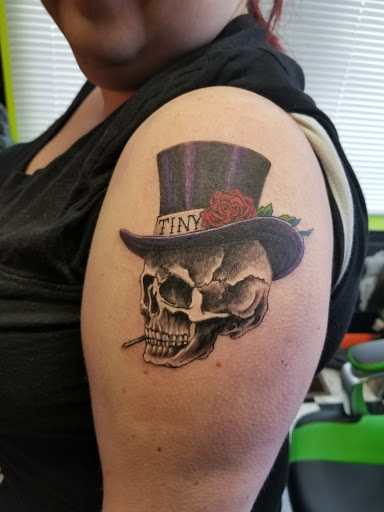 Explore atlas tattoo ideas, creative tattoo ideas in Cranston, available at Artistic Ink