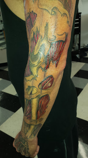 Tattoo Shop «Ink Slingers», reviews and photos, 1355 E Kearney St, Springfield, MO 65803, USA