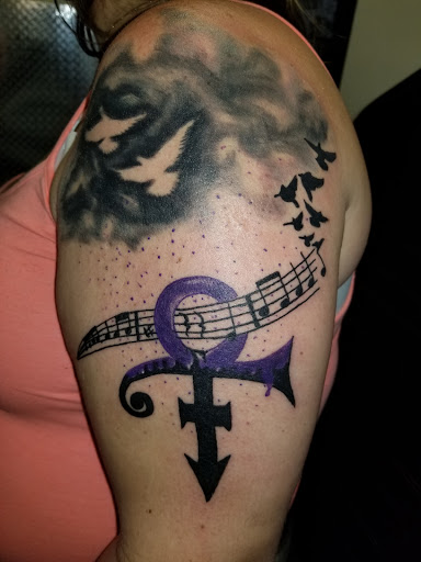 Explore aerosmith tattoo ideas, creative tattoo ideas in Hilliard, available at 22 Caliber Tattoo Mega Studio