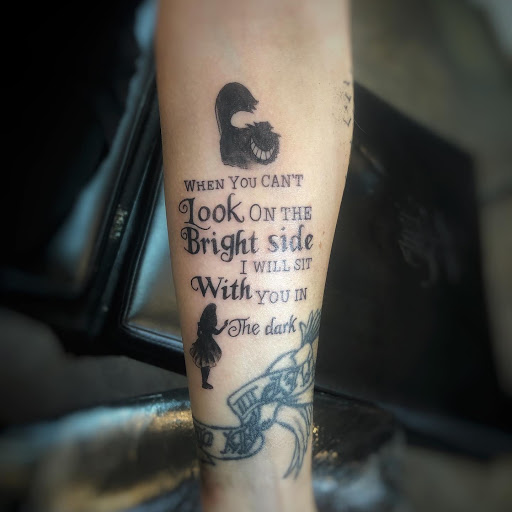 Explore script tattoo ideas for guys, creative tattoo ideas in Meridian, available at Meridian Tattoo