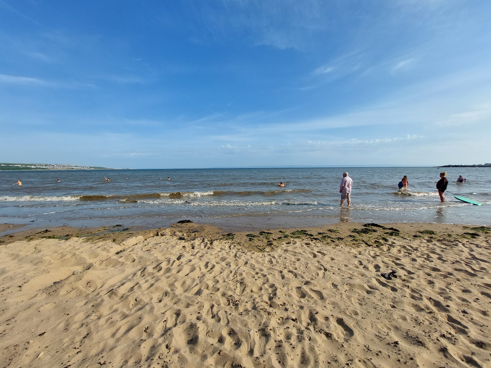 Photo of Porthcawl beach with turquoise water surface