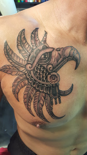 Explore traditional hand tattoo ideas, creative tattoo ideas in Whiteville, available at Coup de Gras 2.0 Tattoo and Body Piercing