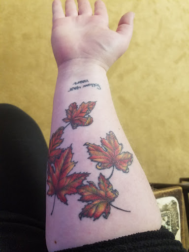 Explore scuba diving tattoo ideas, creative tattoo ideas in Ironwood, available at Iron Ink Tattoos