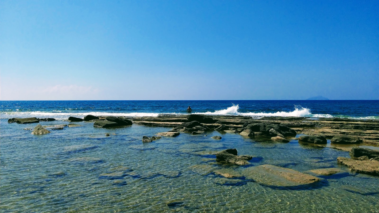 Afrathias beach的照片 带有长直海岸