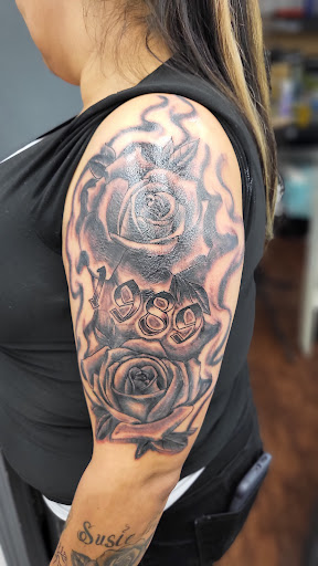Explore tattoo scroll ideas, creative tattoo ideas in Lewiston, available at Walkins tattoos studio