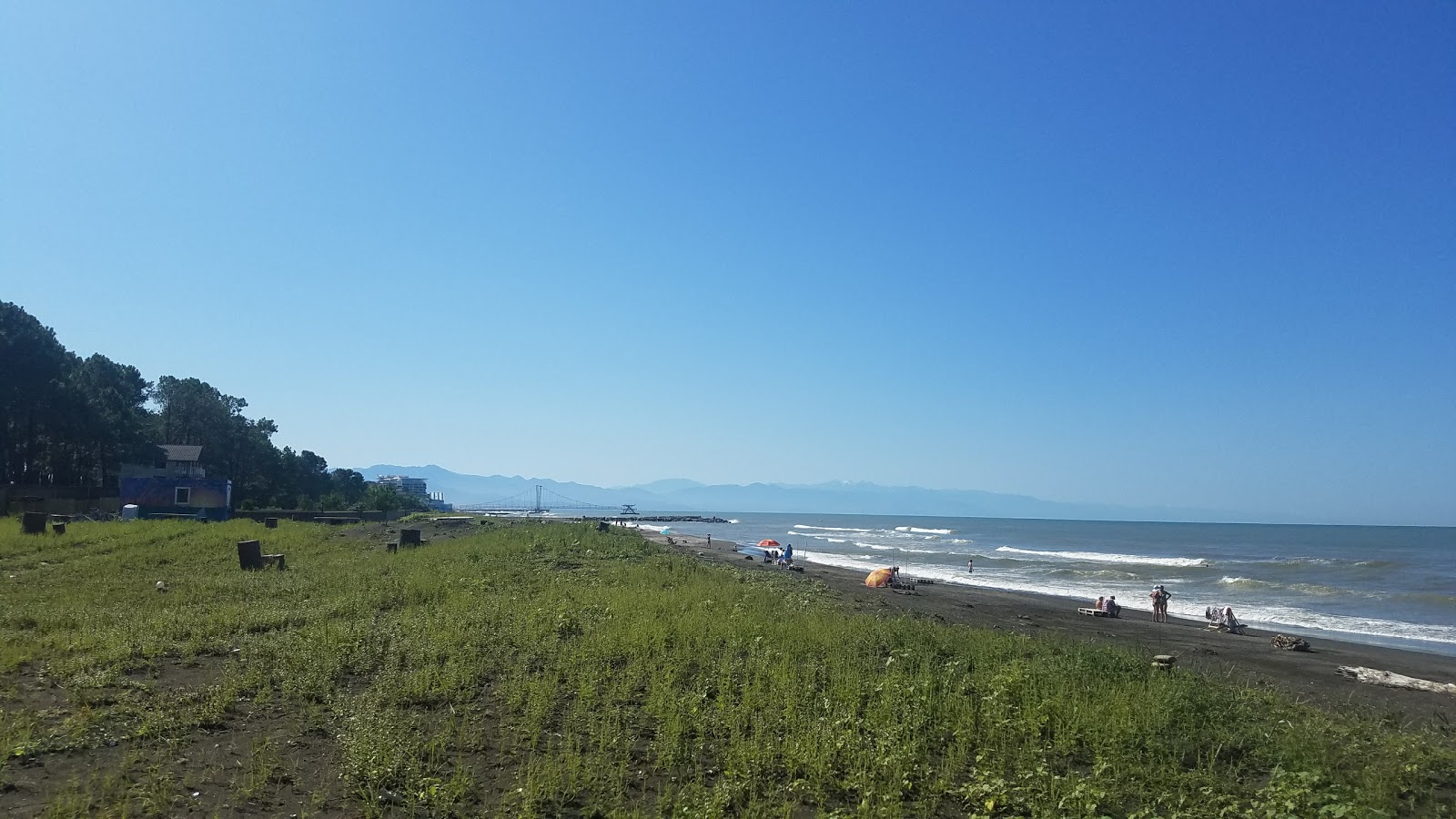 Foto de Kaprovani beach con arena negra superficie