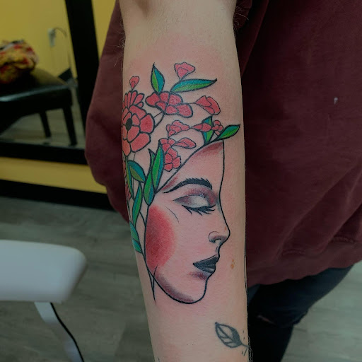 Explore dog bone tattoo ideas, creative tattoo ideas in Marietta, available at Lure Tattooing & Piercing LLC