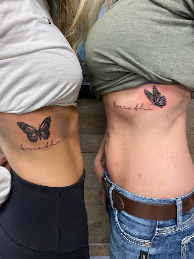 Explore tattoo ideas on ribs for men, creative tattoo ideas in Marietta, available at Sink or Swim Studio and Gallery