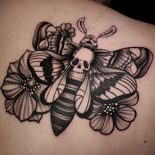 Explore beetle tattoo ideas, creative tattoo ideas in Minocqua, available at Whisky Rose Tattoo Parlor