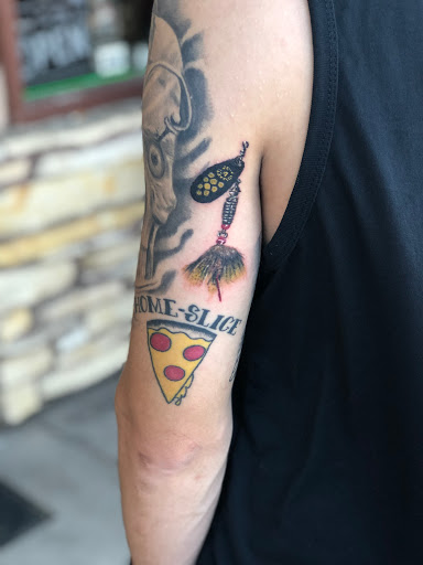 Explore dog tattoo ideas for guys, creative tattoo ideas in Roscoe, available at Elevated Ink Tattoo