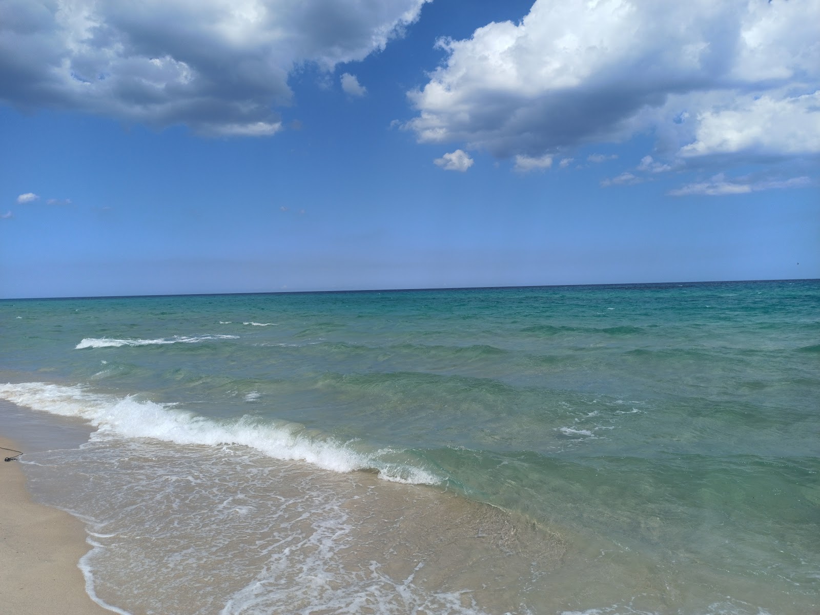 Fotografija Daroufa Beach z prostorna obala