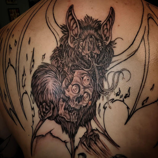 Explore small chicano tattoo ideas, creative tattoo ideas in Palm Harbor, available at Angry Owl Tattoo and Piercing