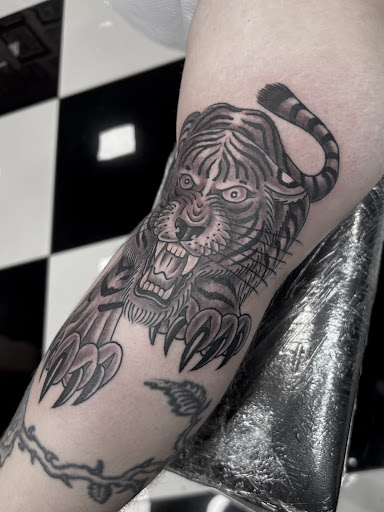 Find mom tattoo ideas for your next unique tattoo in Fort Worth at Pink Cobra Tattoo