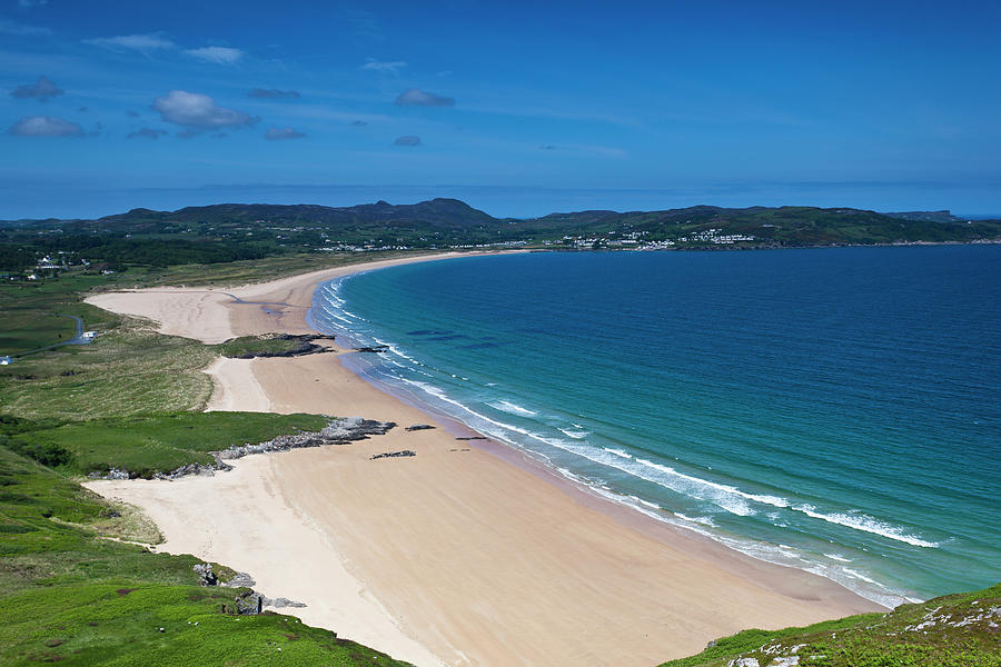 Ballymastocker Beach的照片 带有米色沙子表面