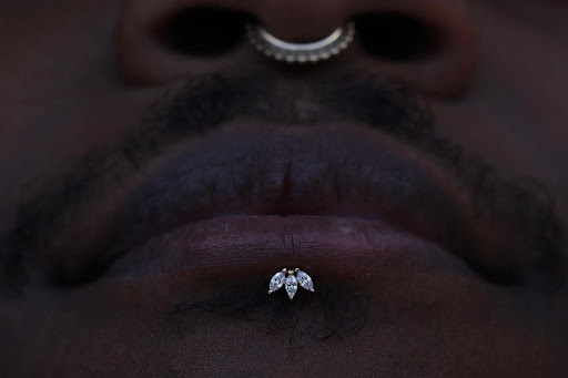 Explore silver lining tattoo ideas, creative tattoo ideas in Hollywood, available at Sacred Eye Tattoos