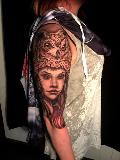 Explore mens bicep tattoo ideas, creative tattoo ideas in Sunbury, available at Absinthe Tattoo