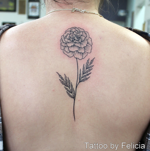 Explore shoulder cap tattoo ideas, creative tattoo ideas in Fort Myers, available at Tiger Lotus Tattoo and Piercing
