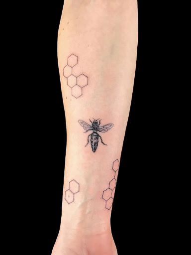 Find bat tattoo ideas for your next unique tattoo in Powell at Elysium Body Enhancements
