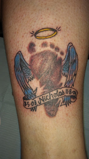 Tattoo Shop «The Ink Well Tattoo Studio», reviews and photos, 154 N Main St, Fredericktown, OH 43019, USA