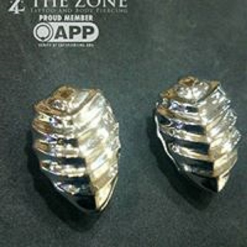 Explore filmmaker tattoo ideas, creative tattoo ideas in Warrensburg, available at The Zone Tattoo & Body Piercing