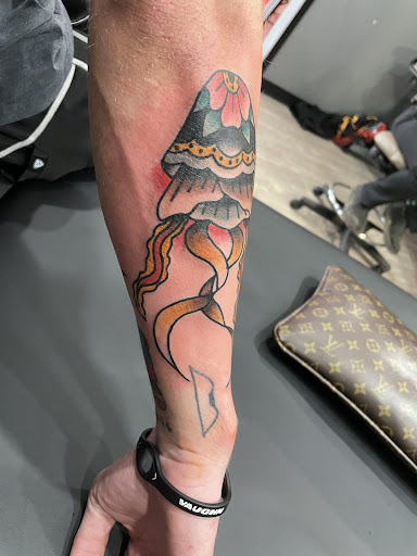 Explore women's thigh tattoo ideas, creative tattoo ideas in Paducah, available at The Tattoo Shop